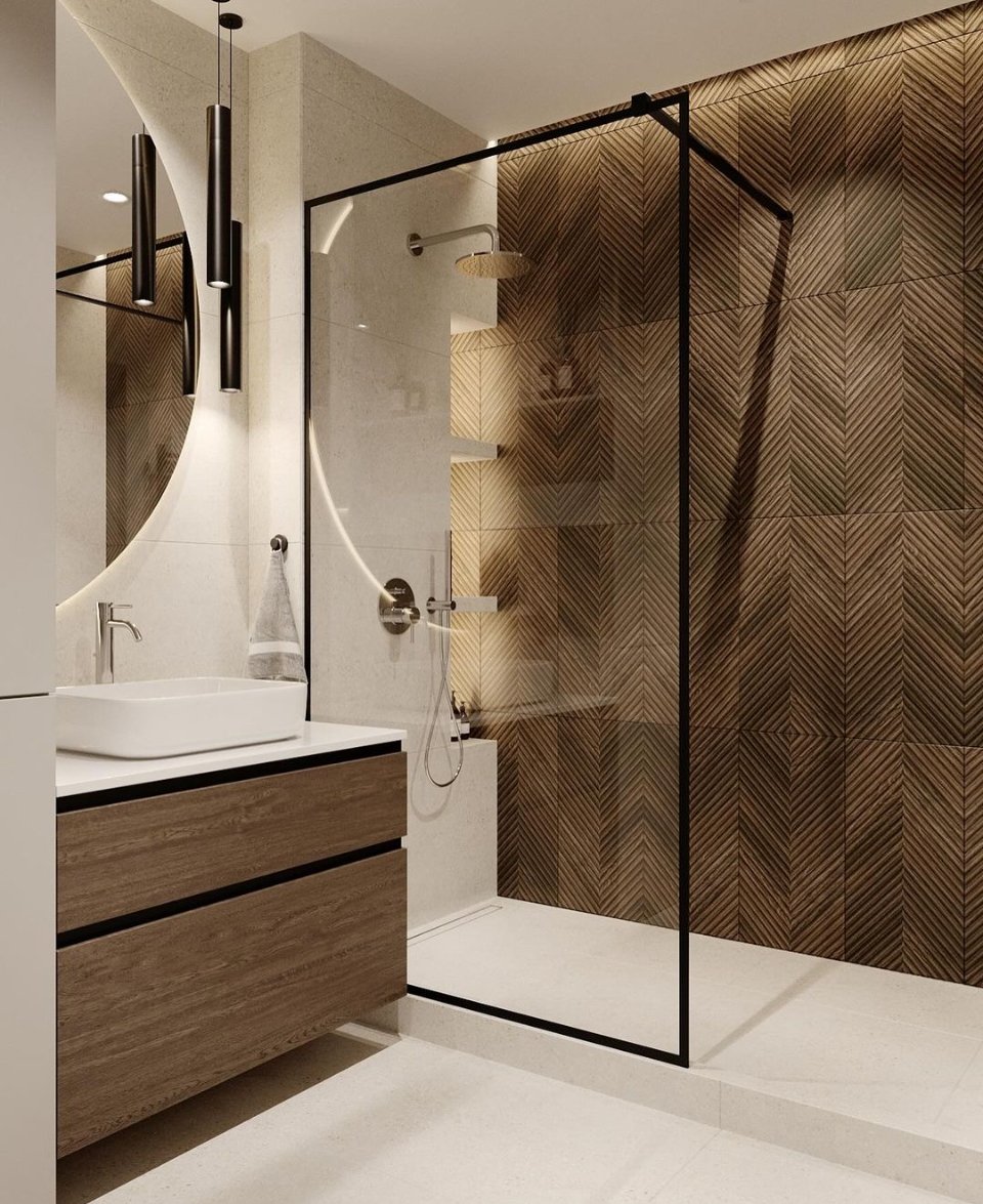 Douche italienne avec mur en chevron – Design graphique et chaleur boisée